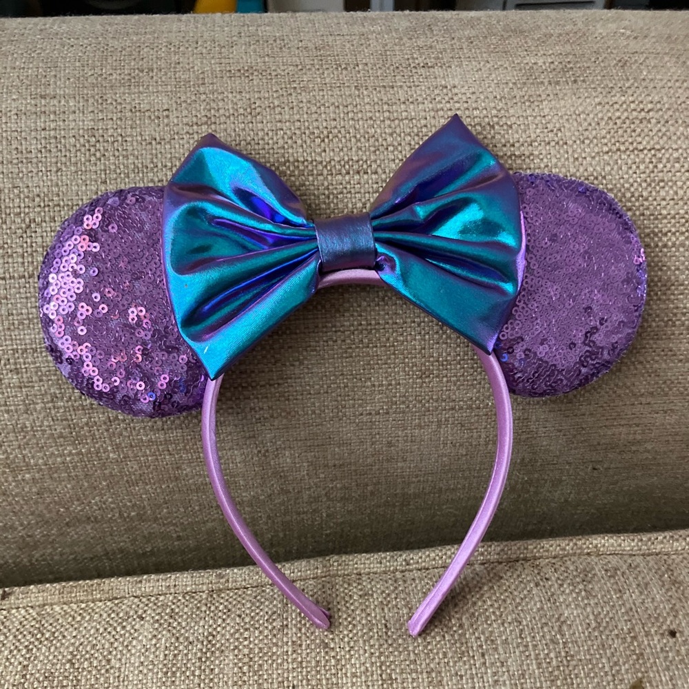 Purple sparkly Disney ears with blue bow